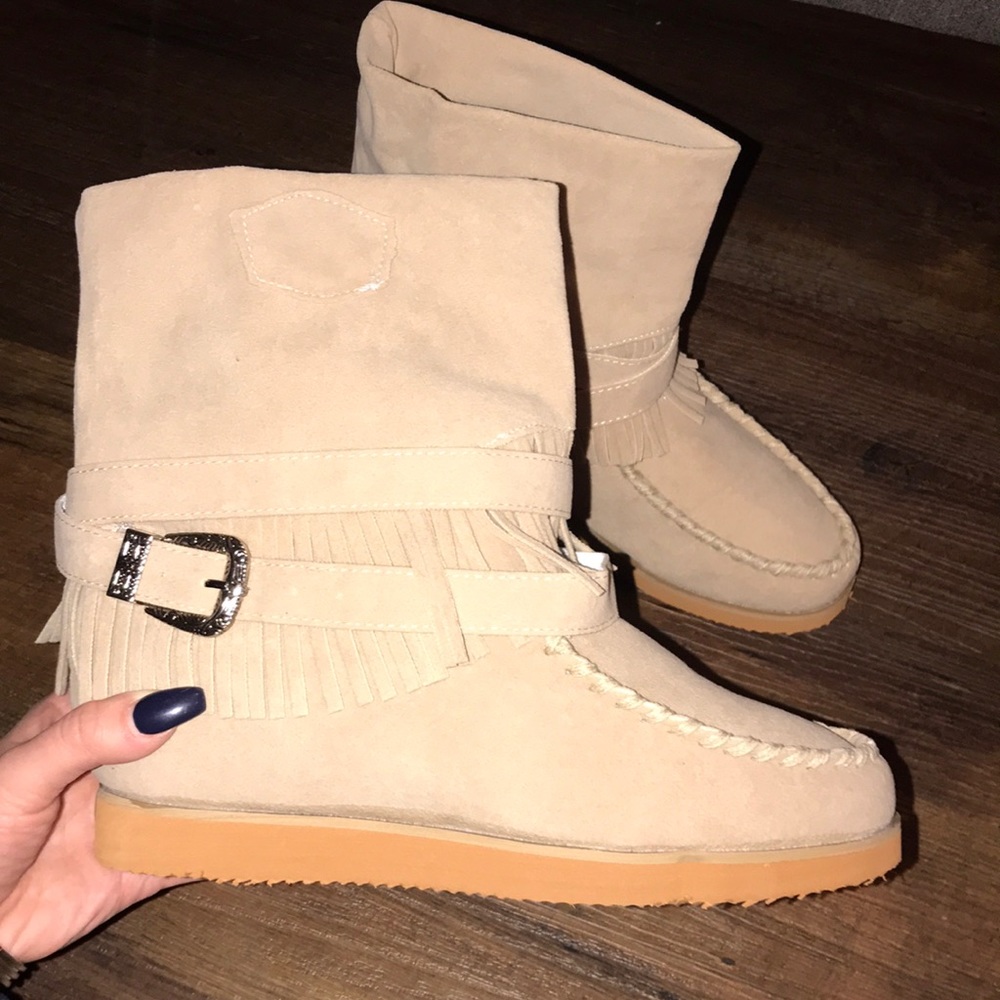 Moccasin style tan ankle boots with buckle